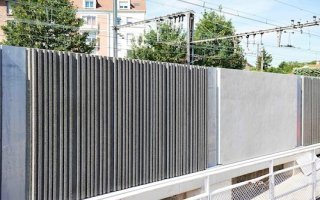 Des murs antibruit en béton de caoutchouc et bois pour la ligne Massy-Valenton - Batiweb