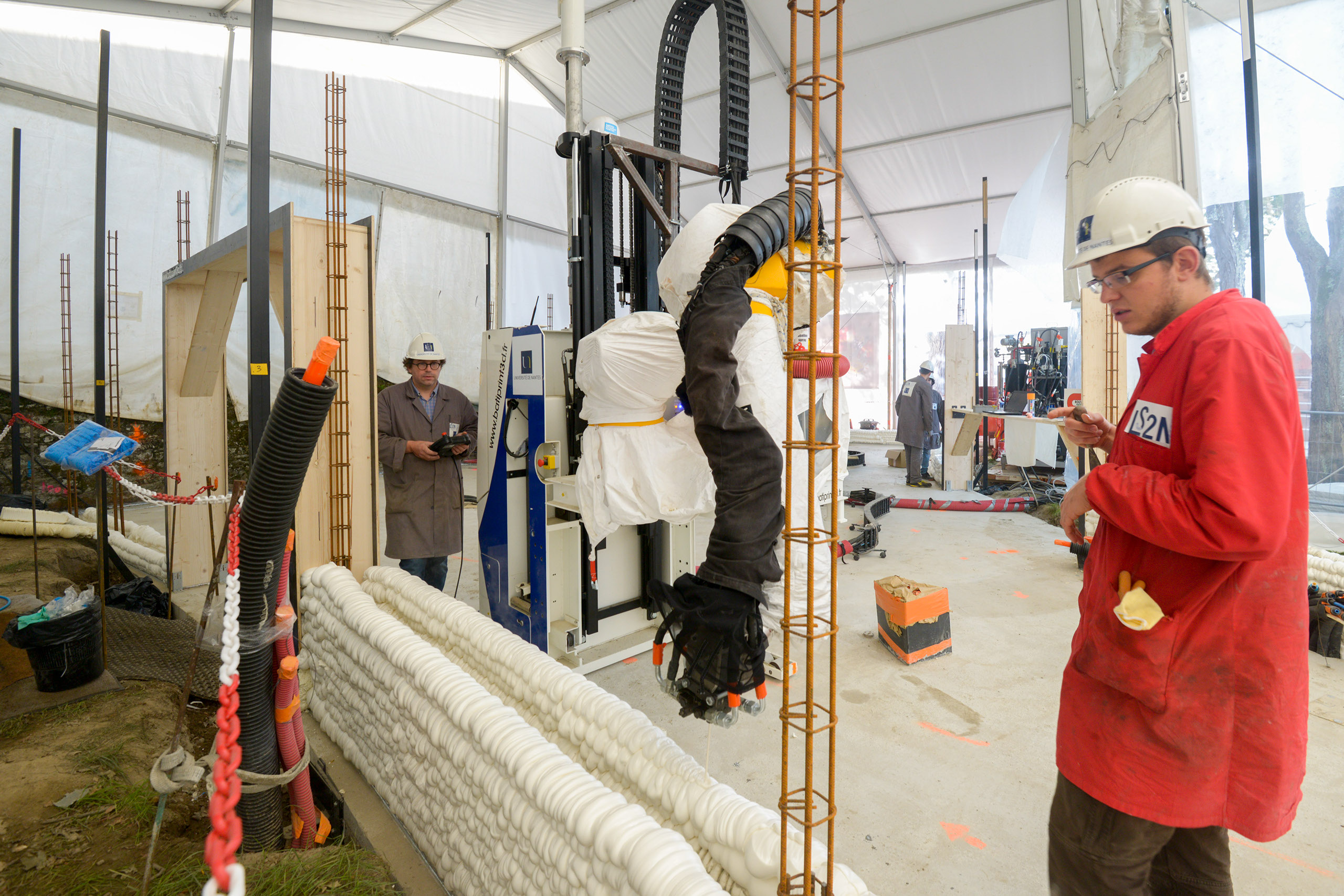 Nantes inaugure une maison construite par un robot-imprimante 3D  - Batiweb