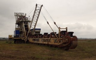 Un excavateur à godets vendu aux enchères - Batiweb