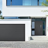 Les portes de garage et portes d'entrée au design assorti - Batiweb