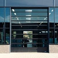 Porte industrielle sectionnelle vitrée NOVOLUX - Batiweb