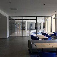 Porte vitrée EI60 Meyvaert Lunax double ou simple action - Batiweb