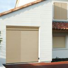 NOUVEAU : Novoferm lance la porte de garage enroulable motorisée ! - Batiweb