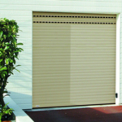 NOVOFERM - Portes de Garage présente NovoRol, la porte enroulable aluminium motorisée - Batiweb