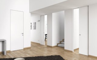 Eclisse développe la tendance à fleur de mur avec les portes Syntesis® Line - Batiweb